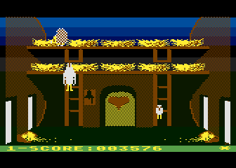 Chicken Chase (Atari 8-bit) screenshot: The chick has hatched and is leaving.