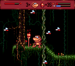 Radical Rex (Genesis) screenshot: Torch lit; checkpoint activated.