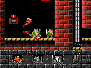 The Lost Vikings (DOS) screenshot: Using teamwork to catapult.