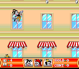 Animaniacs (SNES) screenshot: Trying not to take a nasty fall...