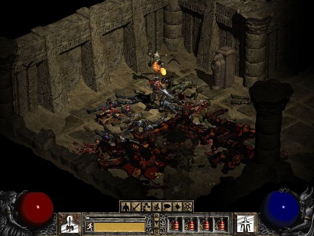 Diablo II (Windows) screenshot: The floor of Tal Rasha's tomb is covered with corpses. Destroy that sarcophagus or more zombies will appear.