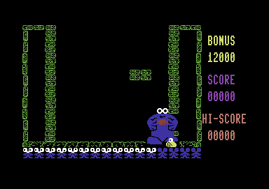 Through the Trap Door (Commodore 64) screenshot: By making Berk eat a sweet, you can provide him with superpowers