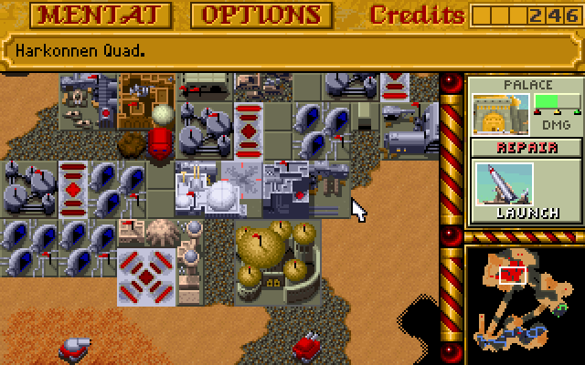 Dune II: The Building of a Dynasty (DOS) screenshot: Harkonnen get the dreadful Death Hand missile at disposal the moment they can build the palace.