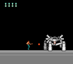 Super Contra (NES) screenshot: It is possible to jump on the back of this boss