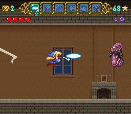 Magical Pop'n (SNES) screenshot: Using the beam at a mini-boss