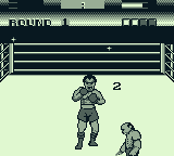 George Foreman's KO Boxing (Game Boy) screenshot: Foreman is down. Can he get back up before the count runs down?