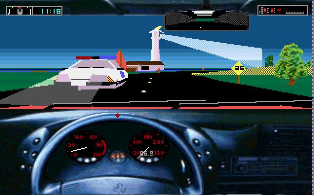 Test Drive III: The Passion (DOS) screenshot: In front of a lighthouse and a cop