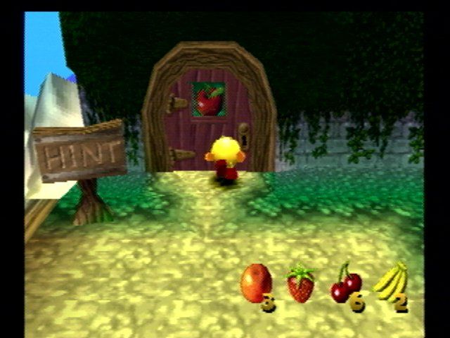 Pac-Man World 20th Anniversary (PlayStation) screenshot: Fruit doors need the appropriate fruit to open.