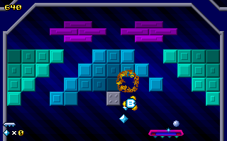 Cybersphere (DOS) screenshot: An exploding brick drops a bonus.