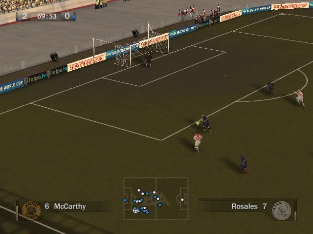 FIFA Soccer 07 (Windows) screenshot: Broadcast camera works every bit like a televised match. However, angle changes make chasing balls a little more complicated.