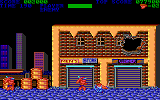 Trojan (DOS) screenshot: Attacking a bad guy... (EGA)