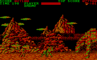 Trojan (DOS) screenshot: Fighting on the second level (CGA).