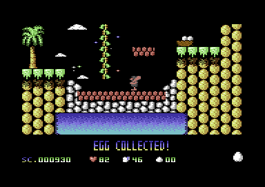 Cavemania (Commodore 64) screenshot: Carrying one of the eggs right now