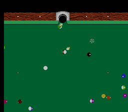 Championship Pool (NES) screenshot: The ghost ball (seen near the arrow pointing to the pocket) showing path of the hit ball. Also any game that needs for the player to call there shots is done automatically shown by the arrows.
