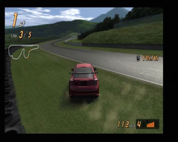 Gran Turismo 4: "Prologue" (PlayStation 2) screenshot: Sliding across the grass.