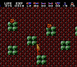 Rambo (NES) screenshot: Navigating the cliff edge with falling rocks. Never a dull moment with Rambo.