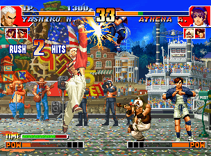 The King of Fighters '97 (Neo Geo CD) screenshot: Athena Asamiya's counterattack chance suddenly dismantled by Yashiro Nanakase's move Upper Duel...