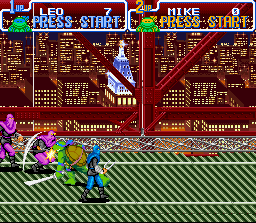 Teenage Mutant Ninja Turtles: Turtles in Time (SNES) screenshot: Leonardo beats Foot Clan soldiers.