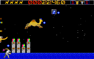 Revenge of the Mutant Camels (DOS) screenshot: Leaping for bonuses and power-ups.