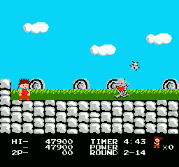 Kid Niki: Radical Ninja (NES) screenshot: Fighting a boss battle against Spike