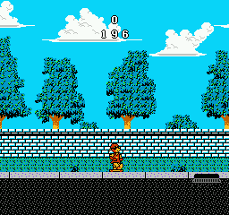 Wally Bear and the NO! Gang (NES) screenshot: Skating on the sidewalk.