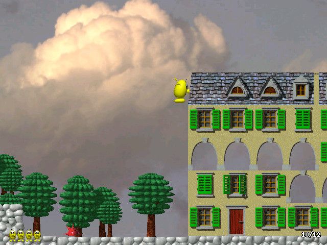 Speedy Blupi (Windows) screenshot: Eggbert can jump high but not quite high enough to conquer this house; note the Lego-inspired trees in the background.