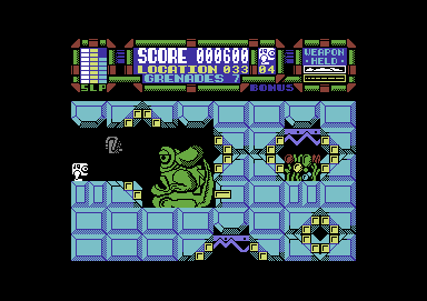 Scumball (Commodore 64) screenshot: Throwing the grenade at the slime monster