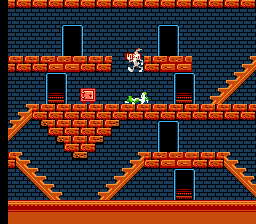 The Bugs Bunny Crazy Castle (NES) screenshot: Hopping onto the green Wile E. Coyote's corpse. Who knew a Bugs Bunny game could be so morbid?