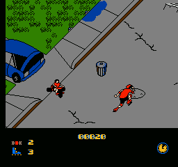 Rollerblade Racer (NES) screenshot: A very busy street... reminds me of <moby gamegroup="Paperboy">Paperboy</moby>.