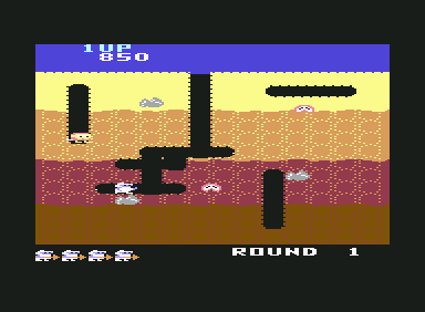 Dig Dug (Commodore 64) screenshot: They're coming through the dirt to get me.