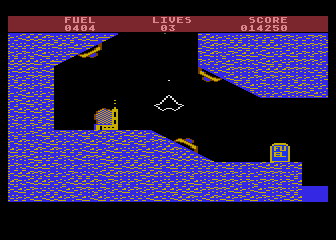 Thrust (Atari 8-bit) screenshot: Things get trickier as you go along; three nasty gun emplacements that will have to be eliminated