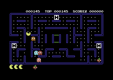 Pacmania (Commodore 64) screenshot: Every now and then, a fruit appears in the maze