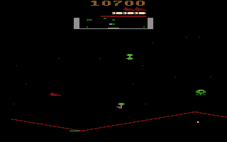 Stargate (Atari 2600) screenshot: Watch out for the green landers!