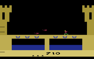 Dragonfire (Atari 2600) screenshot: Dodge dragonfire when crossing the bridge