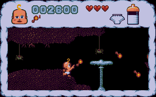 Baby Jo in: "Going Home" (DOS) screenshot: Throwing rattles at icky spiders.
