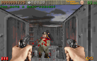 Rise of the Triad: Dark War (DOS) screenshot: Enemy bleeding from the neck.