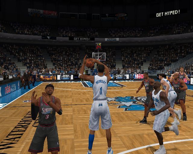 NBA 2K3 (PlayStation 2) screenshot: McGrady has just made an interception. When this happens the game slows and the camera swings around behind the player
