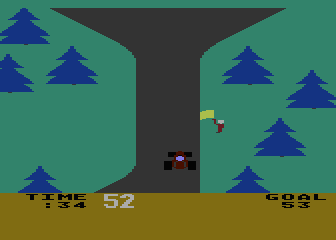 Math Mileage (Atari 8-bit) screenshot: Yellow flag means the player risks overshooting the goal