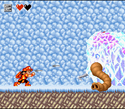 Super Adventure Island II (SNES) screenshot: Boss-fight against a frozen mammoth