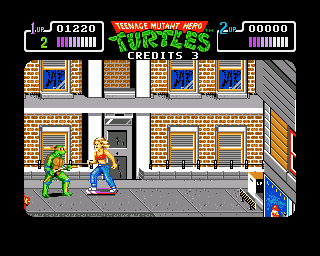 Teenage Mutant Ninja Turtles (Amiga) screenshot: About to be run over by a woman skateboarding
