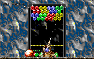 Bust-A-Move (DOS) screenshot: Aiming up a shot.
