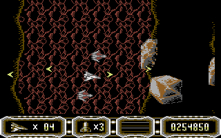 Enforcer: Fullmetal Megablaster (Commodore 64) screenshot: Destroy the rocks before they hit you