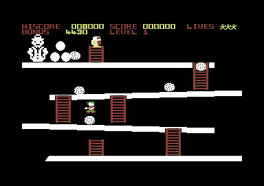 Eskimo Eddie (Commodore 64) screenshot: Jumping over a snowball