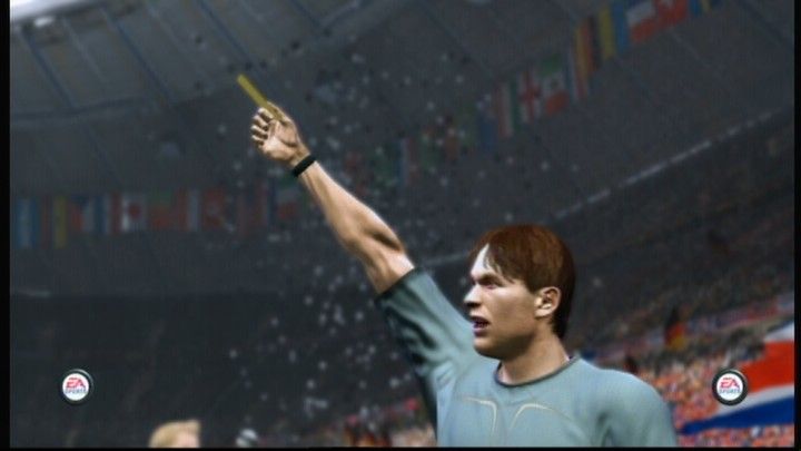 FIFA World Cup: Germany 2006 (Xbox 360) screenshot: Rough play is not so easily tolerated, judge is issuing a yellow card.