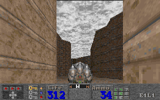 Quiver (DOS) screenshot: The Pentium version replaces the static skyline panorama with an animated cloudy sky a la <i>Quake</i>.