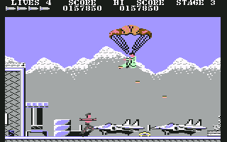 Rush'n Attack (Commodore 64) screenshot: I bet I could parachute down to the ground and drop bombs like him