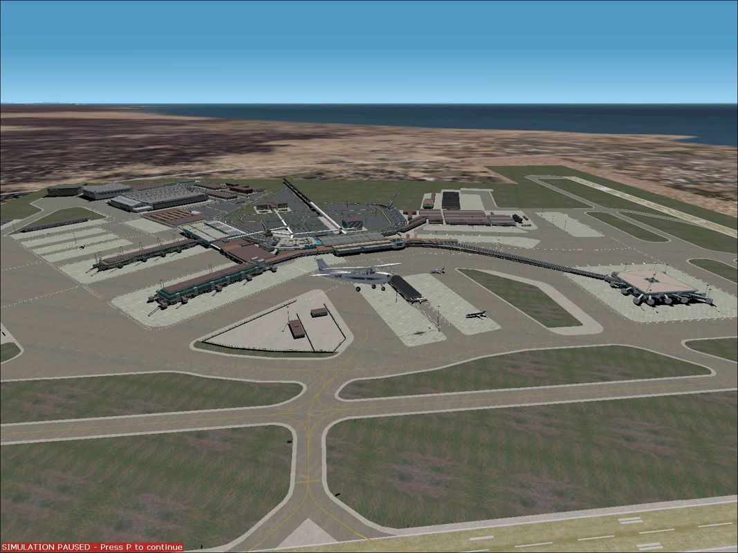 World Airports (Windows) screenshot: Rome's Fiumicino airport buildings by day using Microsoft Flight Sim 2002 default scenery