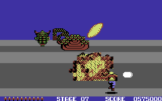 Space Harrier (Commodore 64) screenshot: The seventh boss - the first half is destroyed