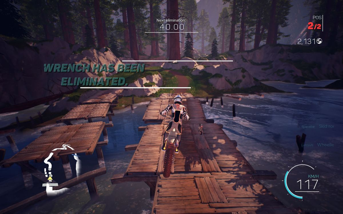 Moto Racer 4 (Windows) screenshot: On a dirt bike in the woodlands area