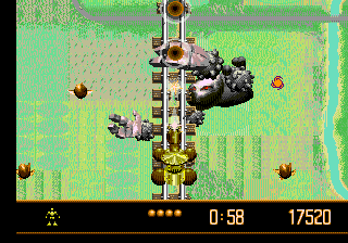 VectorMan (Genesis) screenshot: Stage 2 is a short boss fight. You're a train, and you need to throw off the WarHead